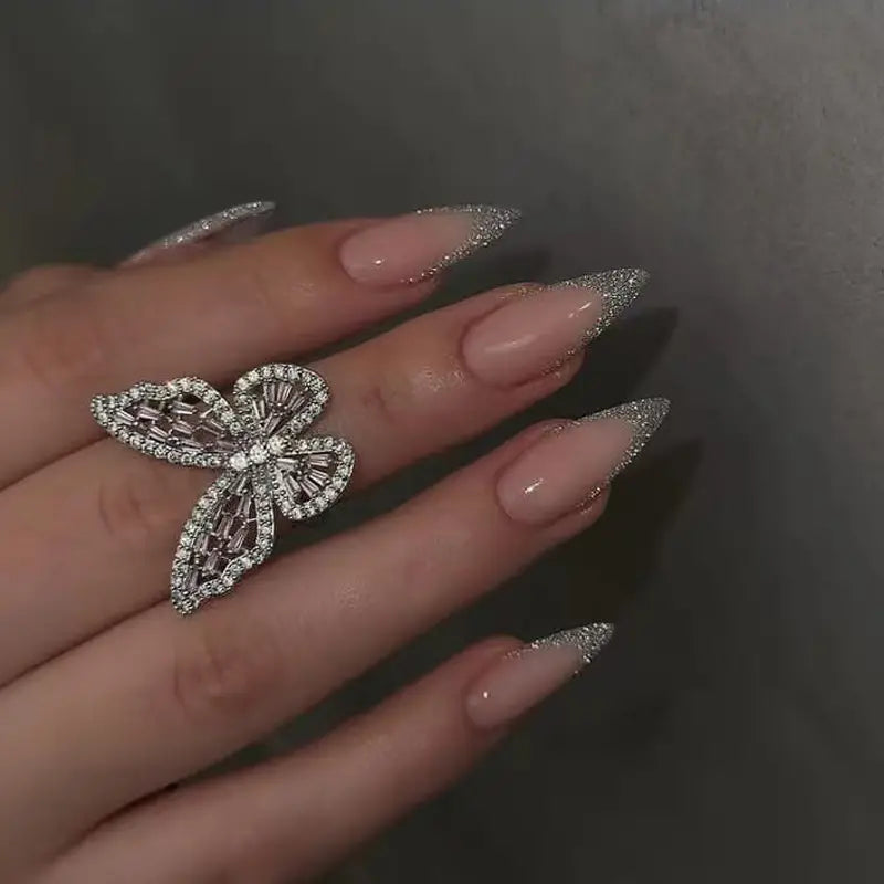 Pinkish false nails with silvery